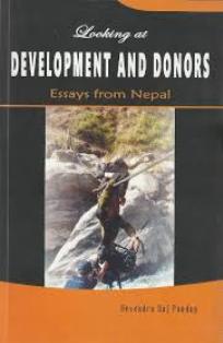 LOOKING AT DEVELOPMENT AND DONORS ESSAYS FROM NEPAL